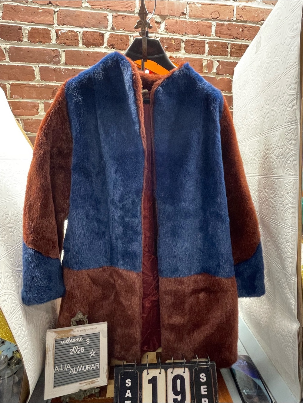 striking vintage Saks Fifth Avenue color-block plush coat, crafted in France.